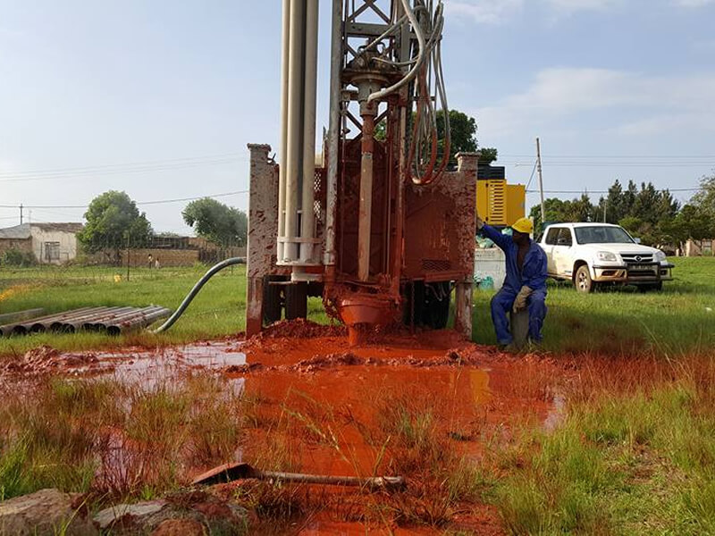drill truck with red mud