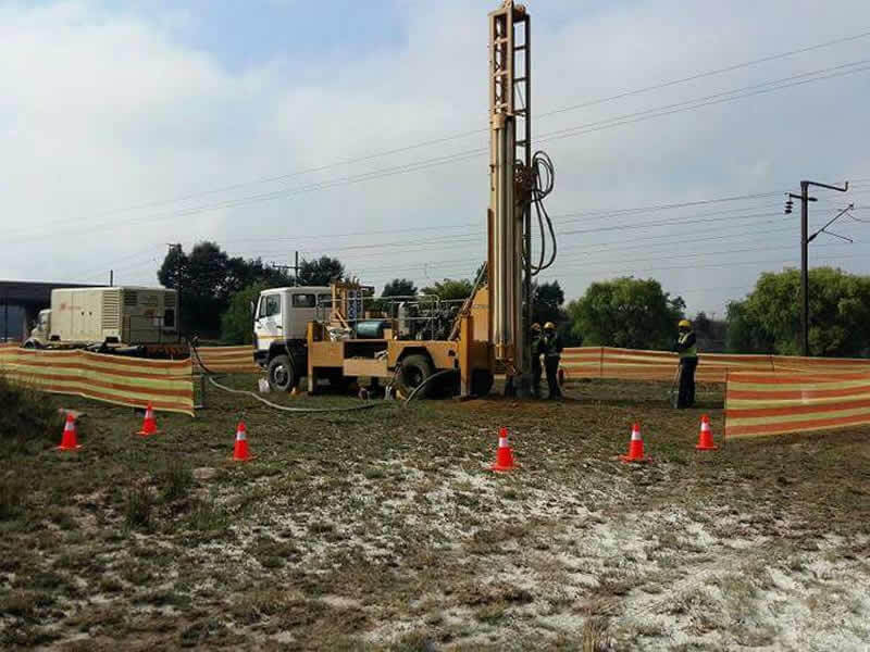 drilling truck with safety cones
